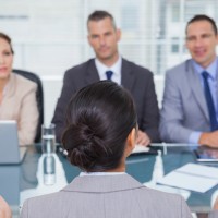 Young applicant having an interview in bright office